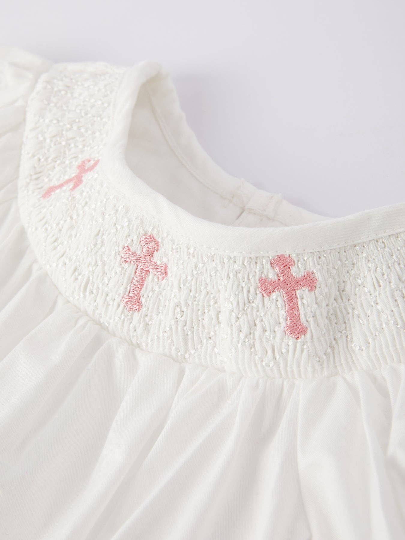 White Chtistening Smocked Romper