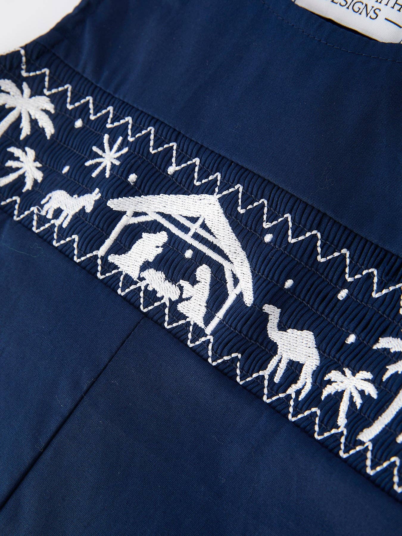 Navy Nativity Smocked Romper